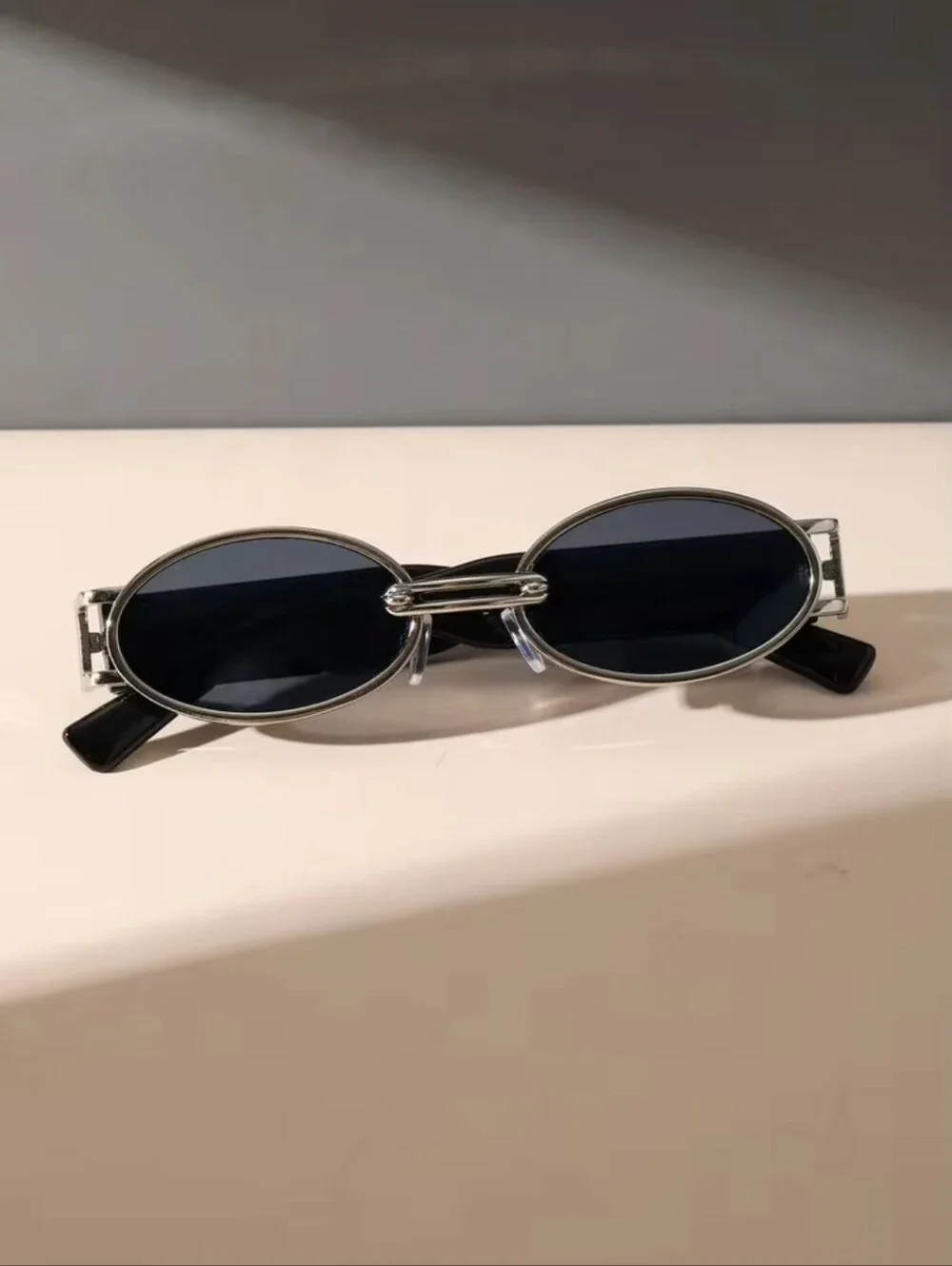 Round Black Sunglasses with Silver Accents